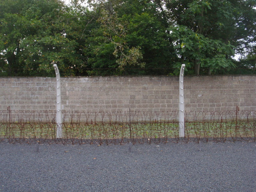 Views of the barbed wire fence, wall, and nuetral zone.